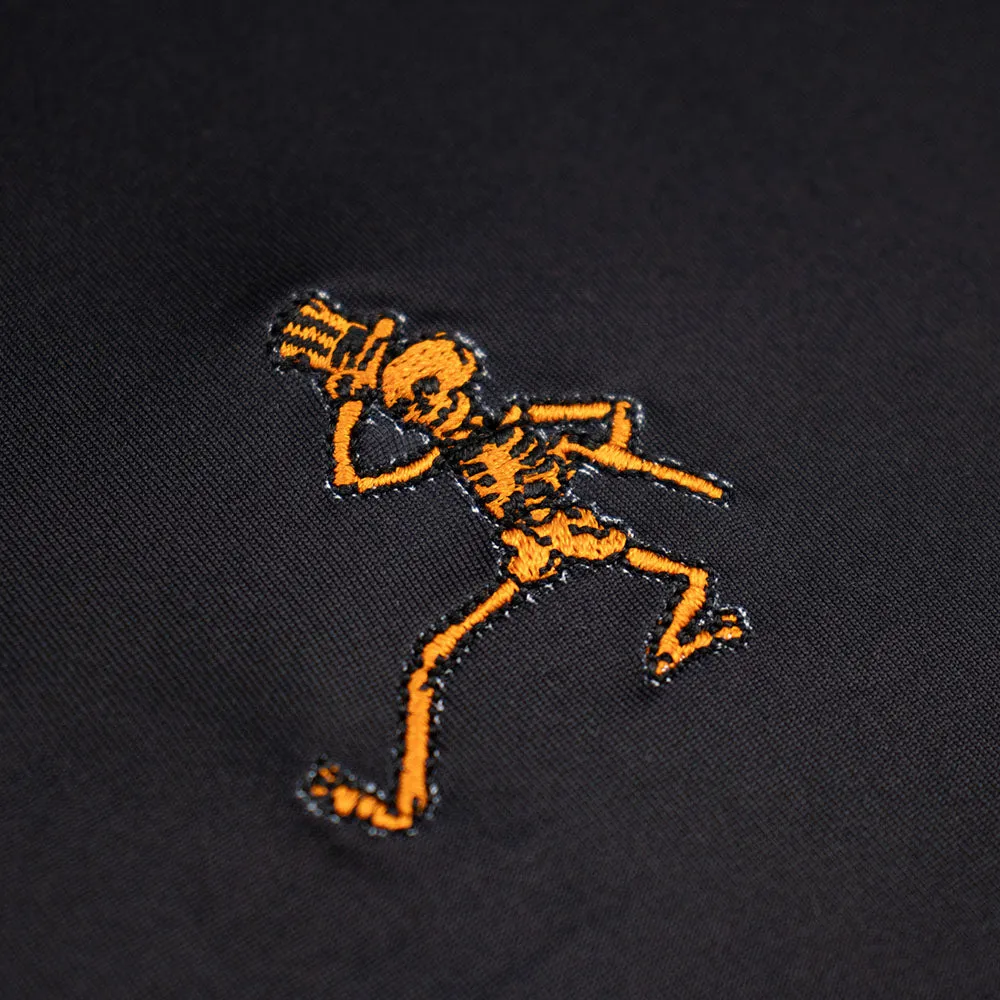 Grateful Dead | Game Day Performance Polo | Orange Skeleton and Black